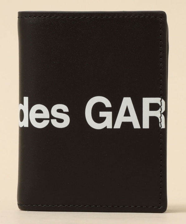 COMME des GARCONS: HUGE LOGO �J�[�h�P�[�X